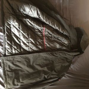 Think cold weather, winter coat.